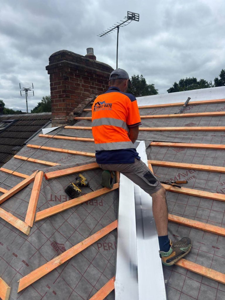 applying battons and underlay on roof